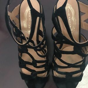 Black Elie Tahari sandals.